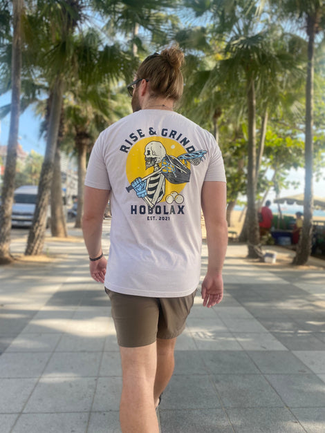 Lacrosse apparel display featuring Rise & Grind shirt from Hobo Lax