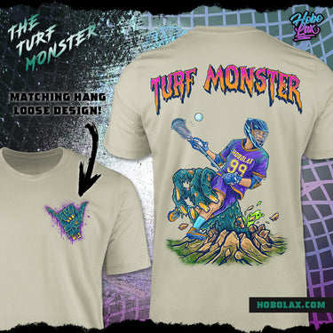 Beige t-shirt featuring "TURF MONSTER" text and a dynamic graphic of a lacrosse player with monster-like features emerging from rocky terrain.